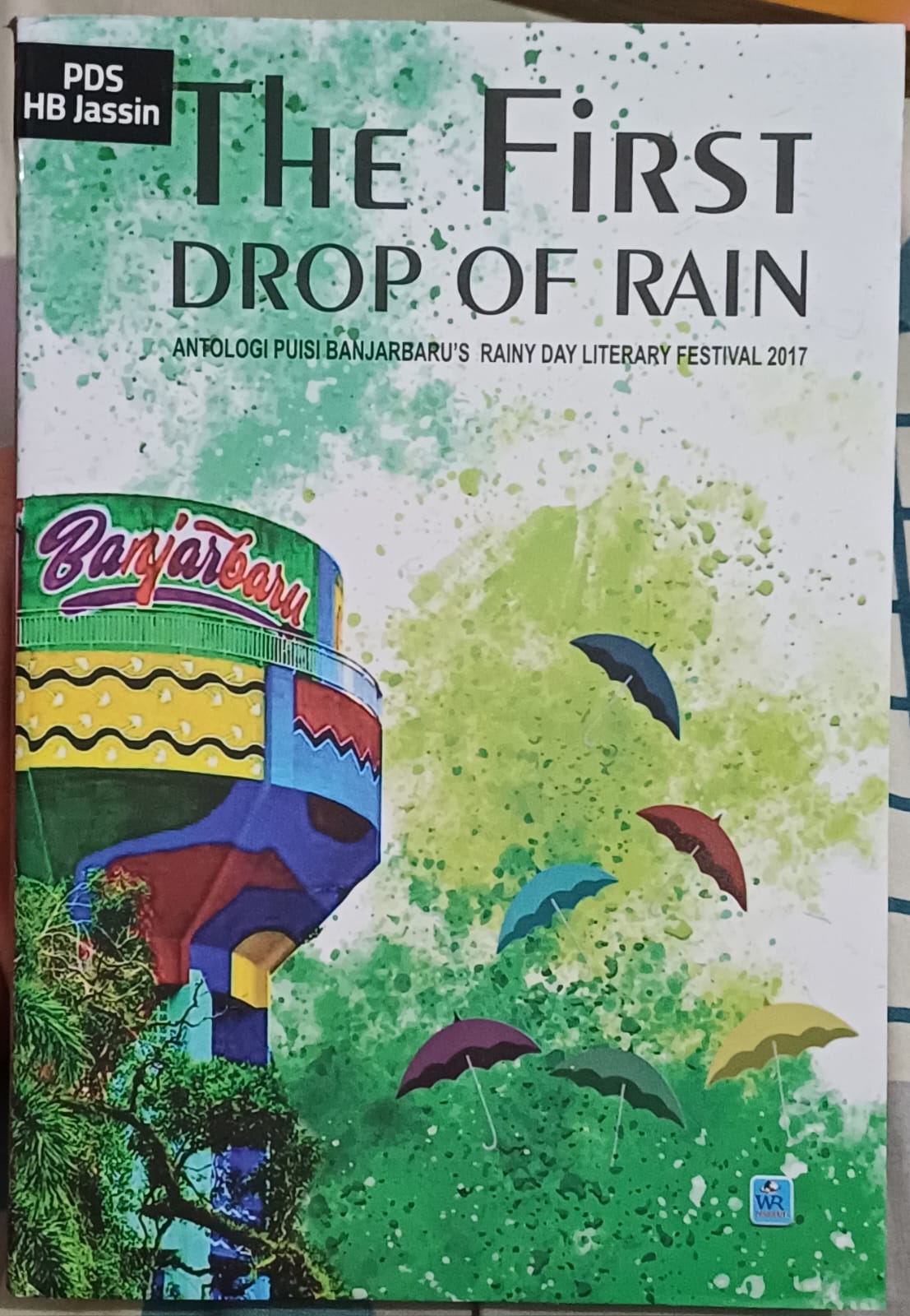 The first drop of rain :  Antologi puisi Banjarbaru's rainy day literary festival 2017