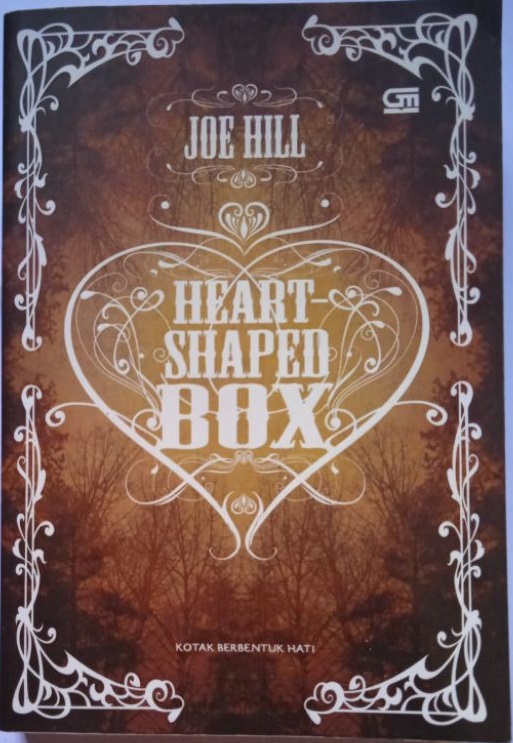 Heart shaped box = :  kotak berbentuk hati
